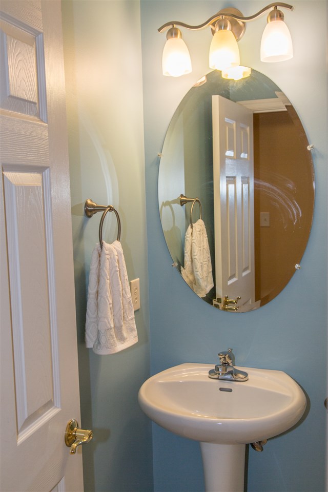 50 Oak Grove Road Palmyra, VA 22963 - Photo 41 of 50 a bathroom with a sink and mirror