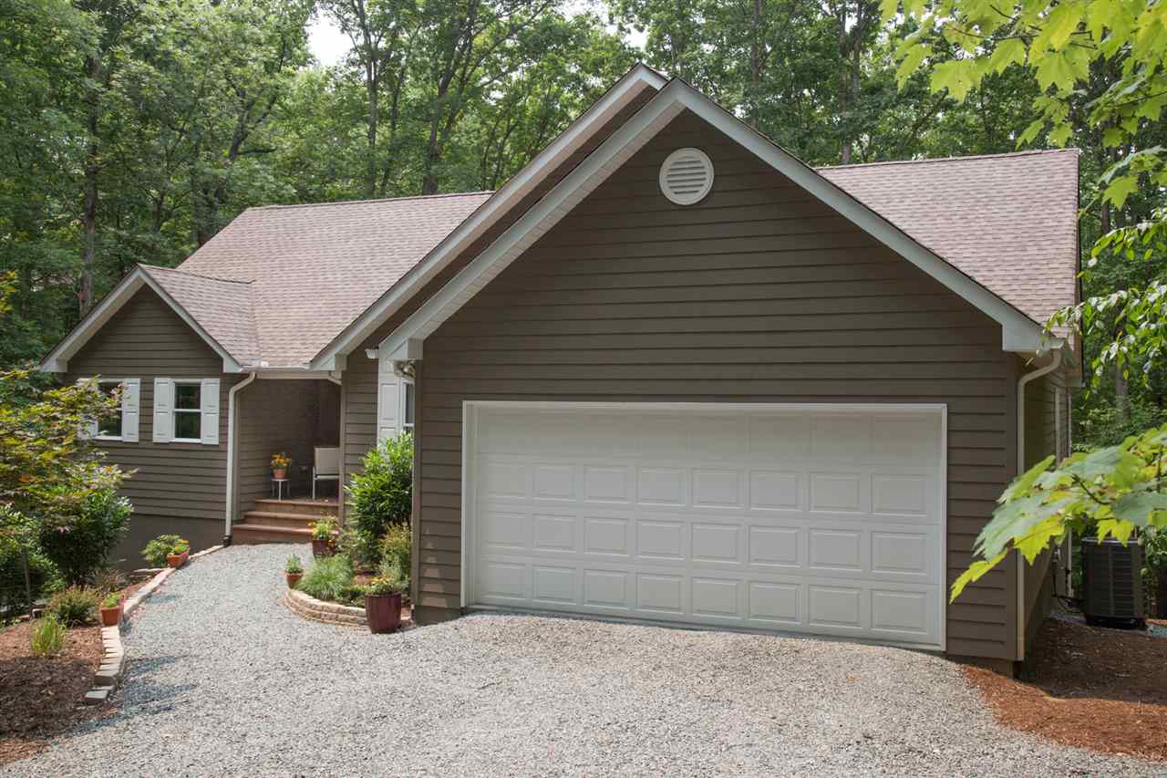 50 Oak Grove Road Palmyra, VA 22963 - Photo 6 of 50 a front view of a house with a yard