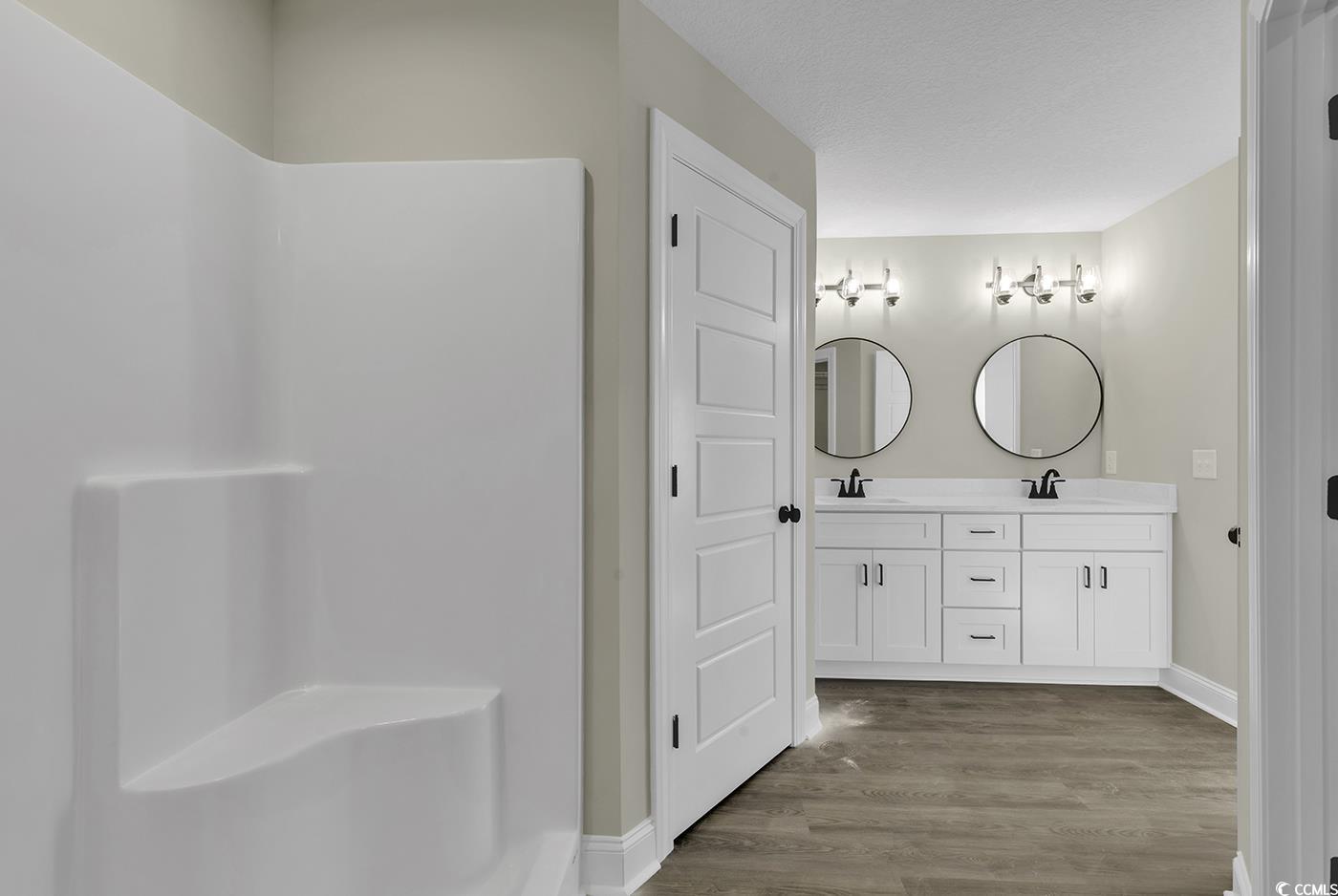 3255 Red Bluff Road Loris, SC 29569 - Photo 37 of 38 Full bath featuring double vanity and light wood finished floors