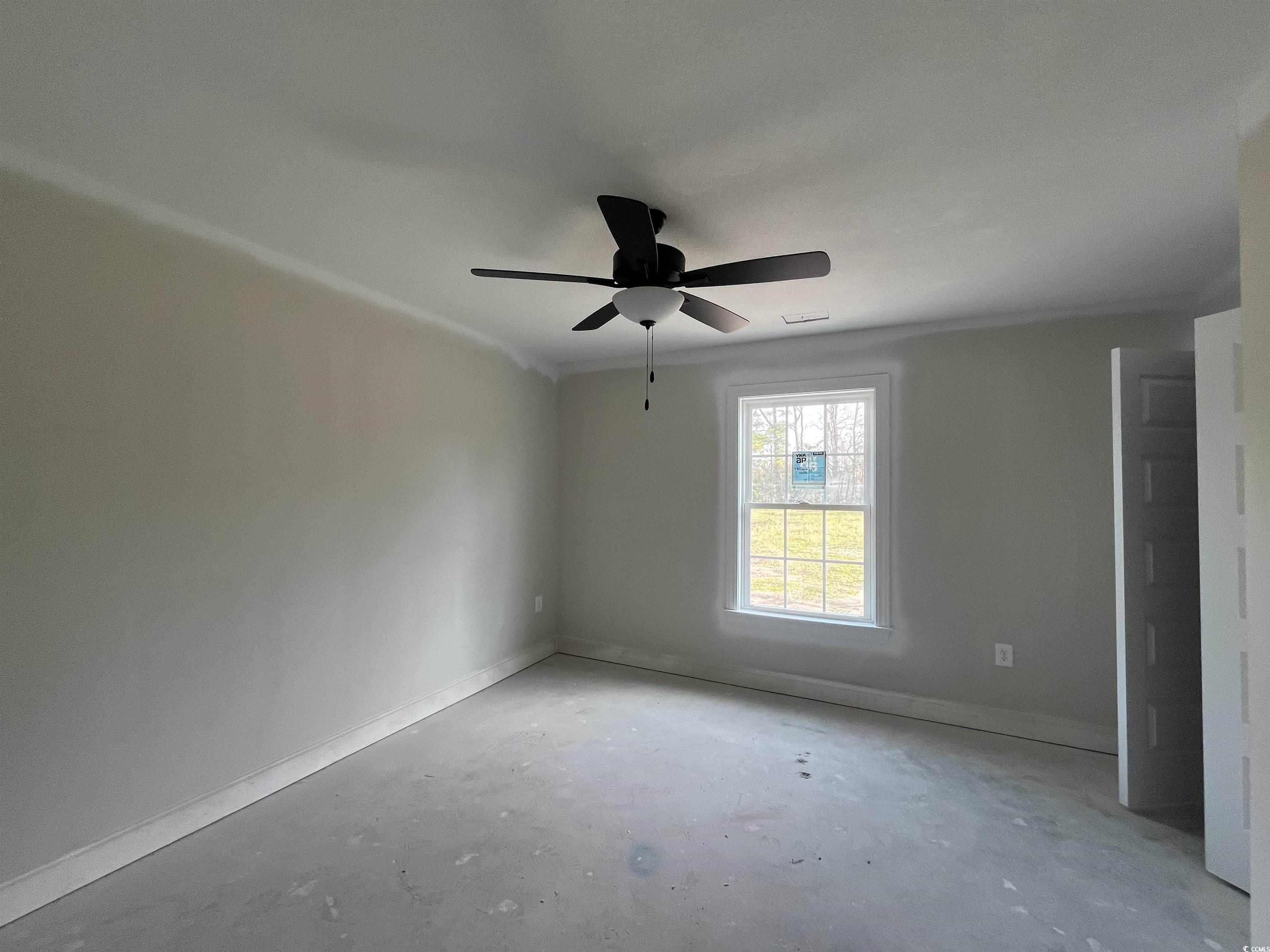 3255 Red Bluff Road Loris, SC 29569 - Photo 8 of 38 Unfurnished room with concrete flooring and ceiling fan