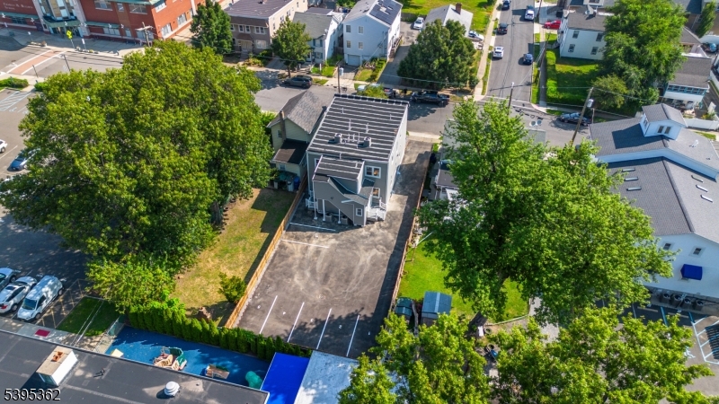 26 Washington Street, Unit 1 Montclair, NJ 07042 - Photo 13 of 34 an aerial view of multiple houses with yard
