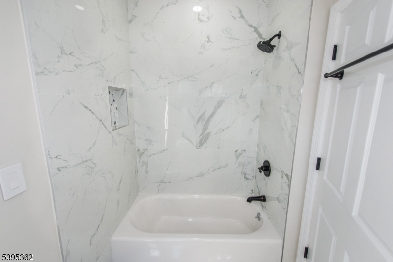 26 Washington Street, Unit 1 Montclair, NJ 07042 - Photo 24 of 34 a bathroom with a bathtub