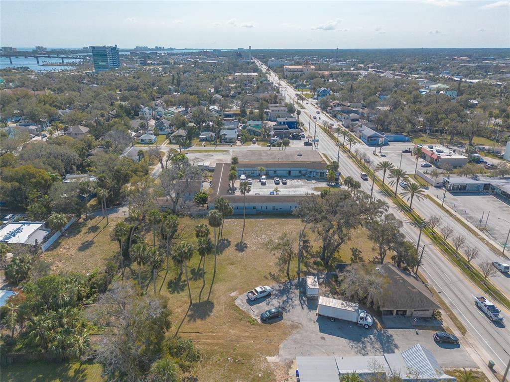 629 North Ridgewood Avenue Daytona Beach, FL 32114 - Photo 4 of 10 an aerial view of multiple house