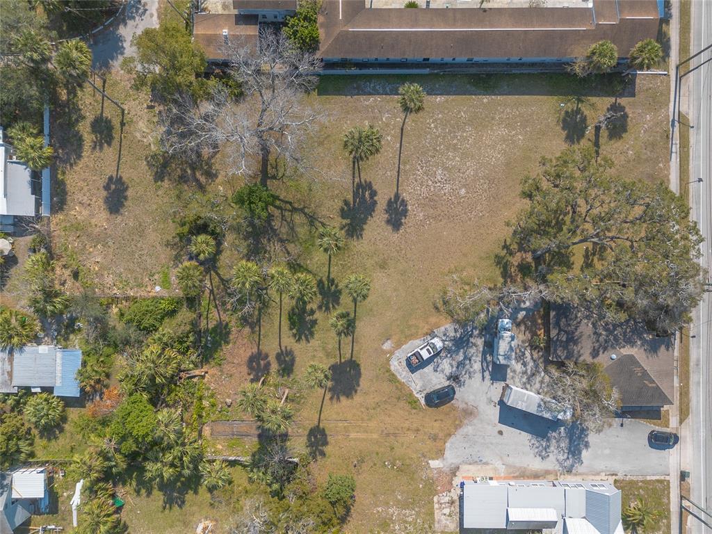 629 North Ridgewood Avenue Daytona Beach, FL 32114 - Photo 10 of 10 a aerial view of a house with a yard