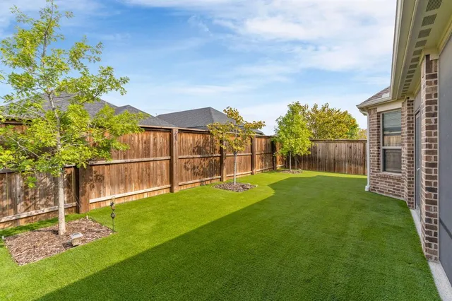 a view of empty room with windows