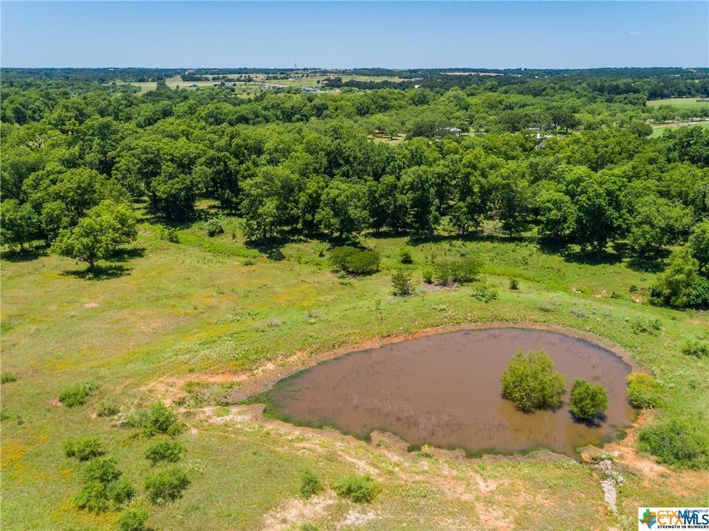 Undisclosed Address Elgin, TX 78621 - Photo 11 of 16 a view of a field with an trees