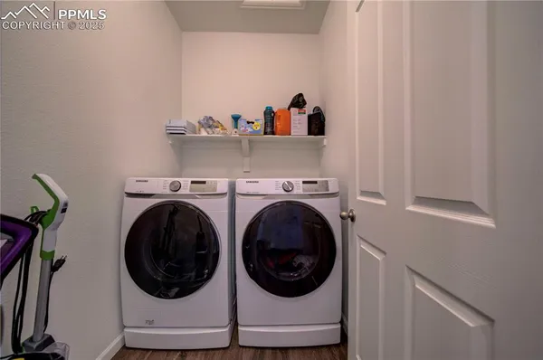 a building outdoor space with patio furniture and a potted plant