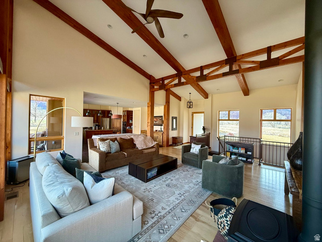 425 Amber Lane Moab, UT 84532 - Photo 5 of 27 Living area with light wood-style flooring, ceiling fan, vaulted ceiling, and recessed lighting