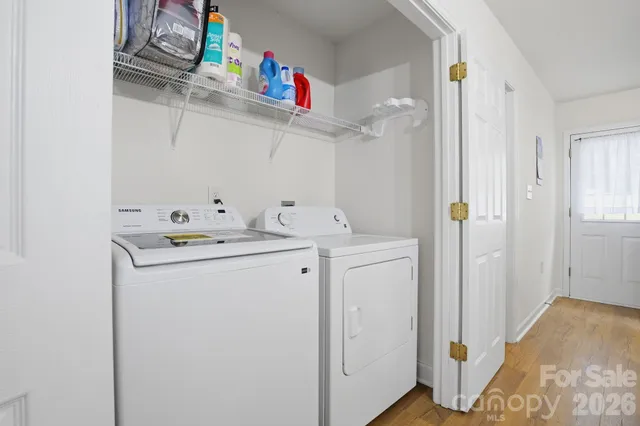 a utility room with dryer and washer