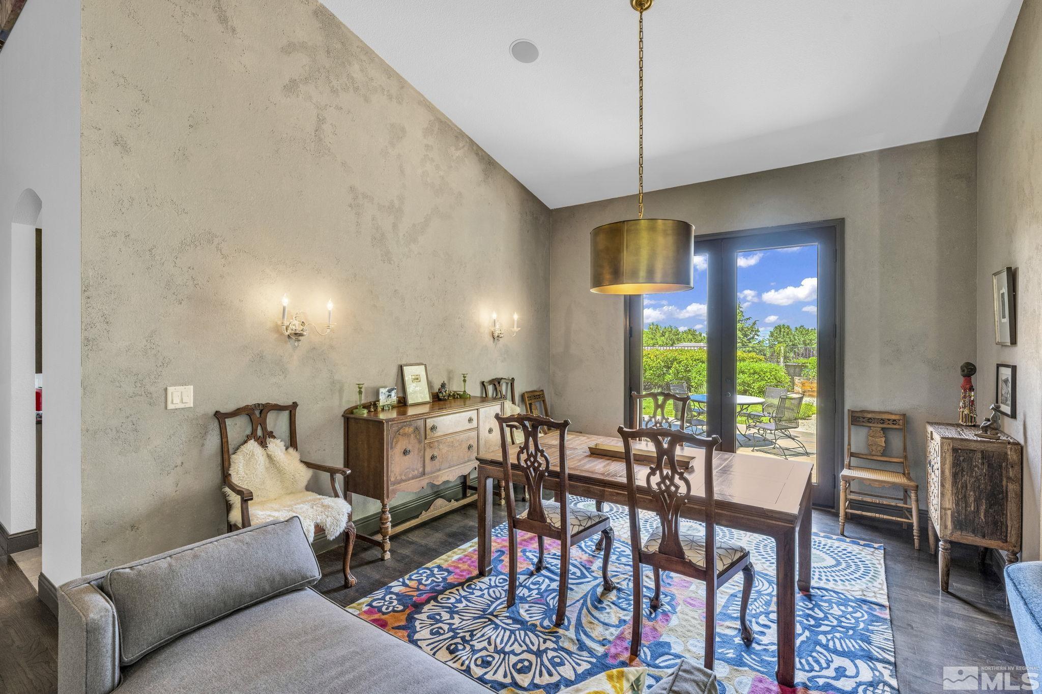 1857 Far Niente Court Reno, NV 89519 - Photo 8 of 37 a living room with furniture and a floor to ceiling window