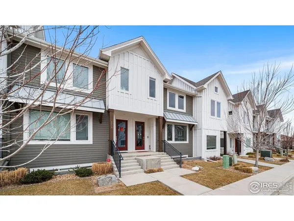a outdoor space with lots of white furniture