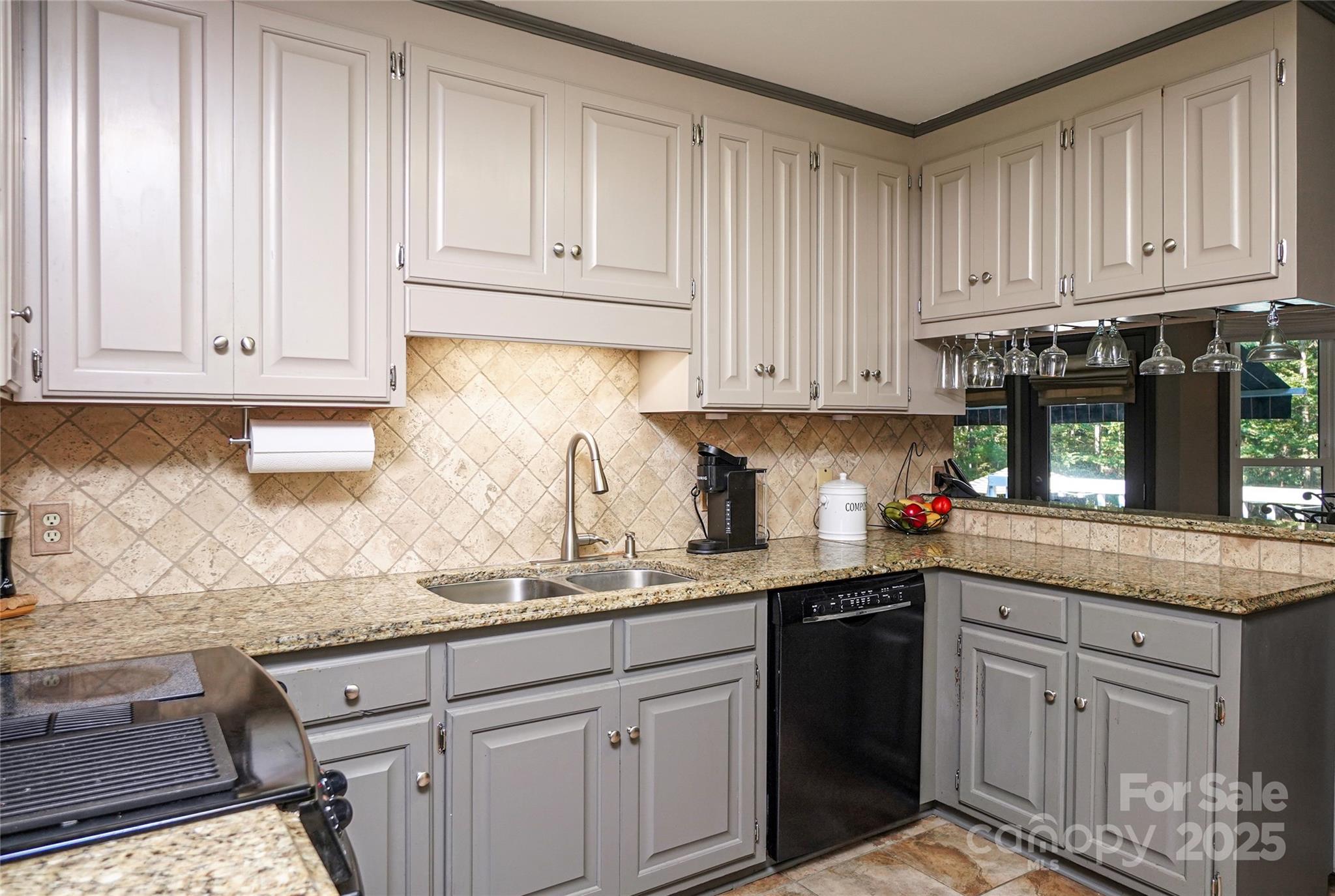1115 John Short Road Indian Land, SC 29707 - Photo 11 of 48 a kitchen with granite countertop wooden cabinets and a sink