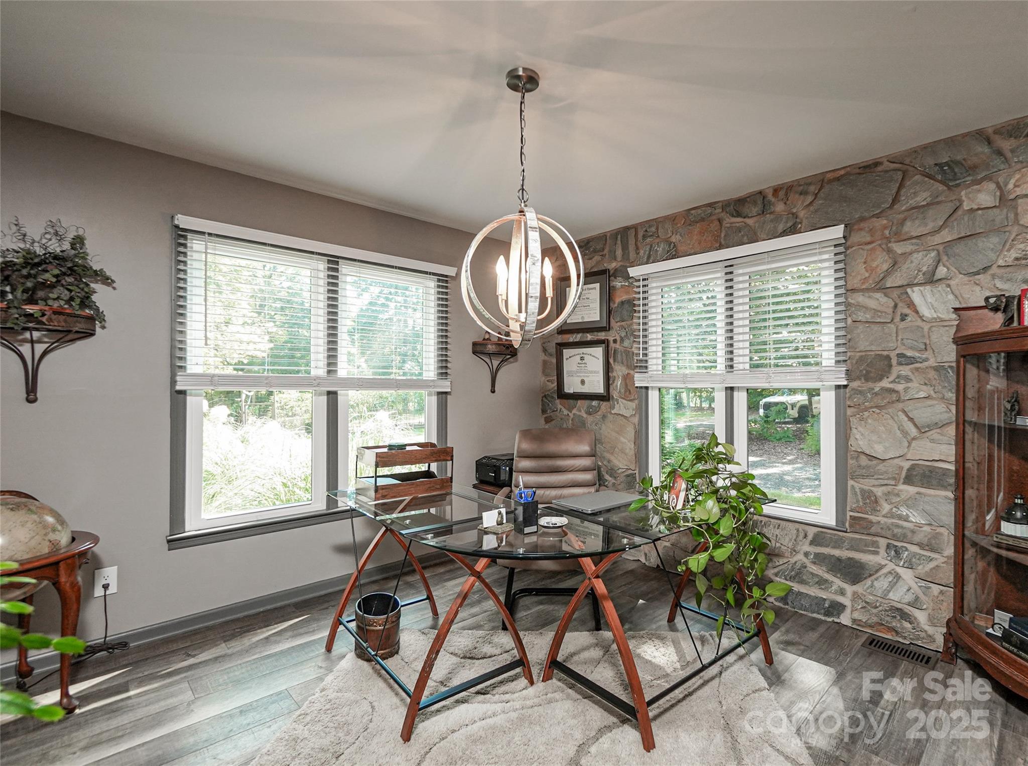 1115 John Short Road Indian Land, SC 29707 - Photo 13 of 48 a living room with furniture a window and a chandelier