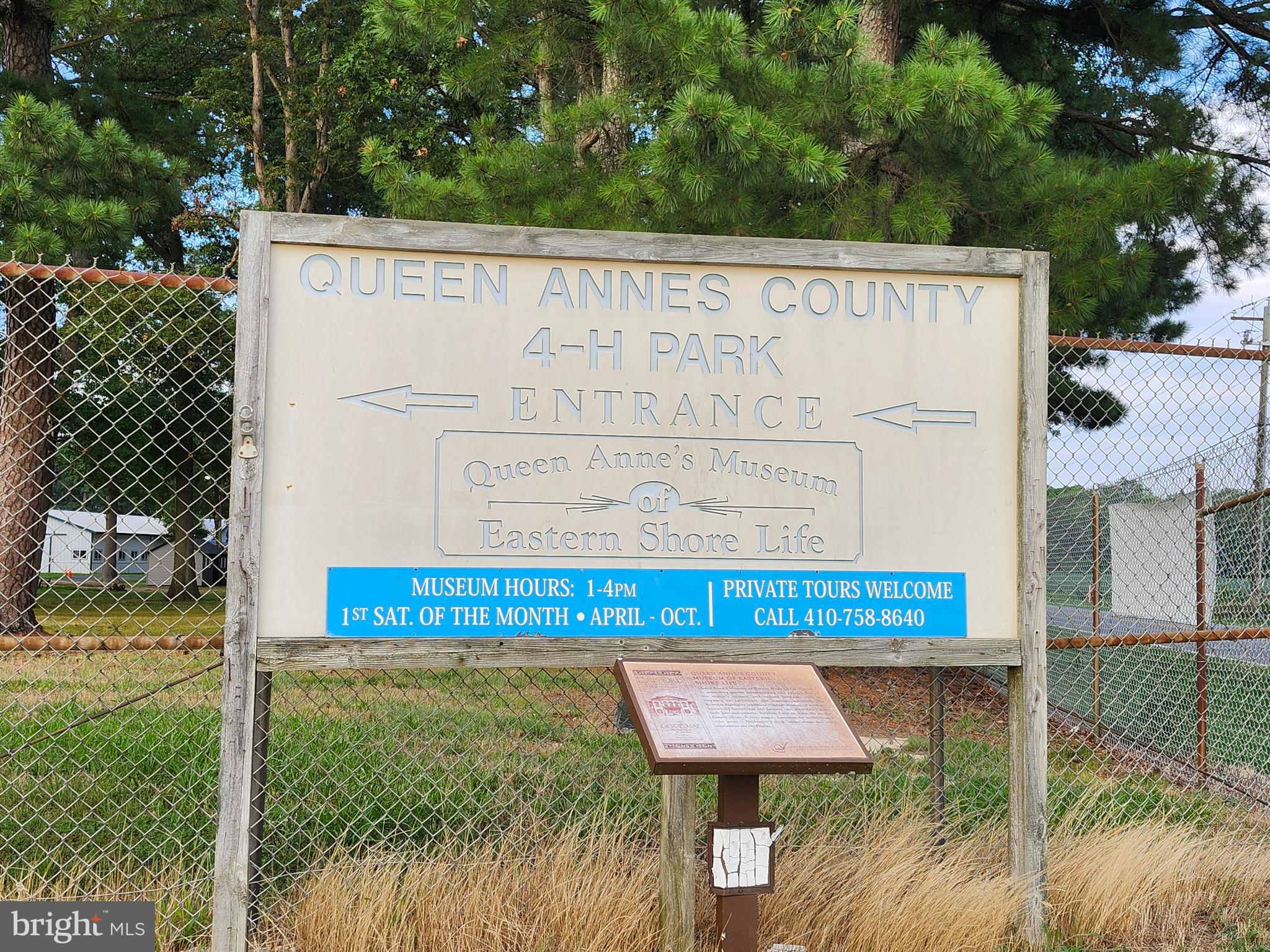 303 Queens Colony High Road Stevensville, MD 21666 - Photo 12 of 21 a sign on the side of a building