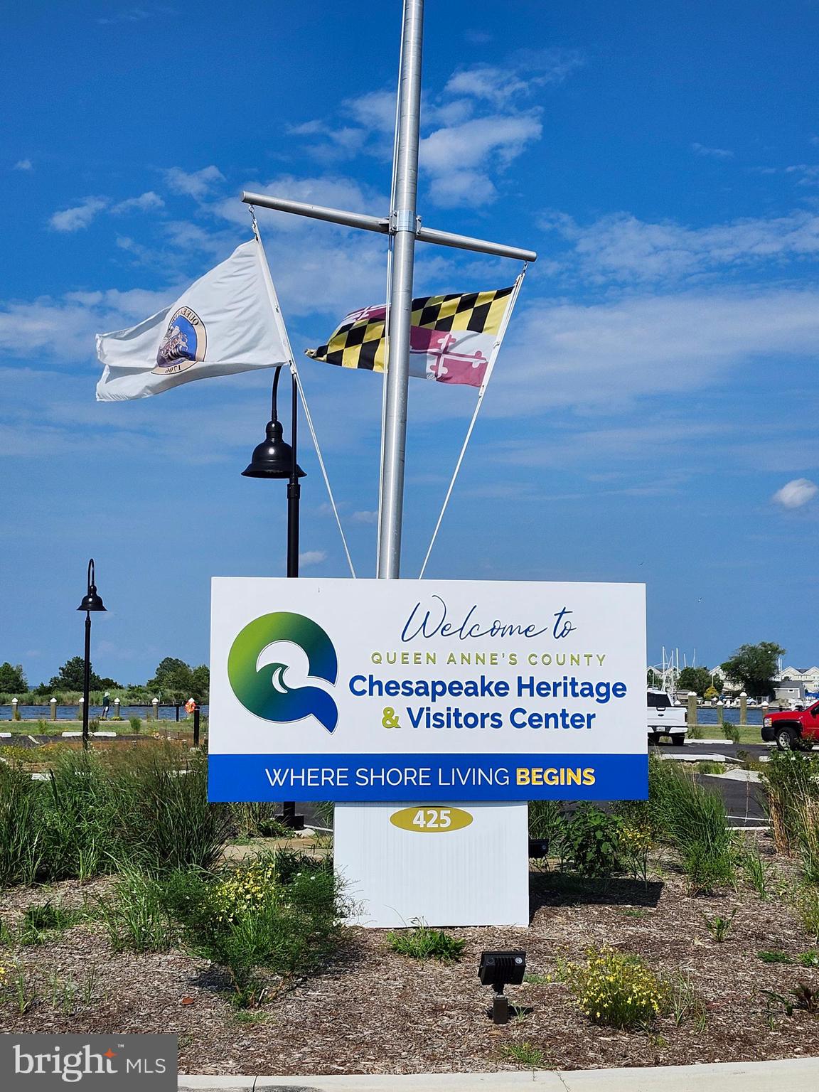 303 Queens Colony High Road Stevensville, MD 21666 - Photo 7 of 21 a sign on the side of a road