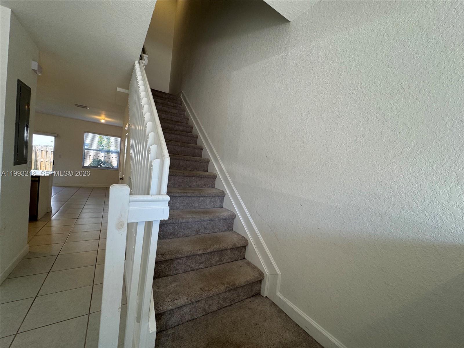 16227 Southwest 292nd Street Homestead, FL 33033 - Photo 12 of 28 a view of entryway and hall with wooden floor