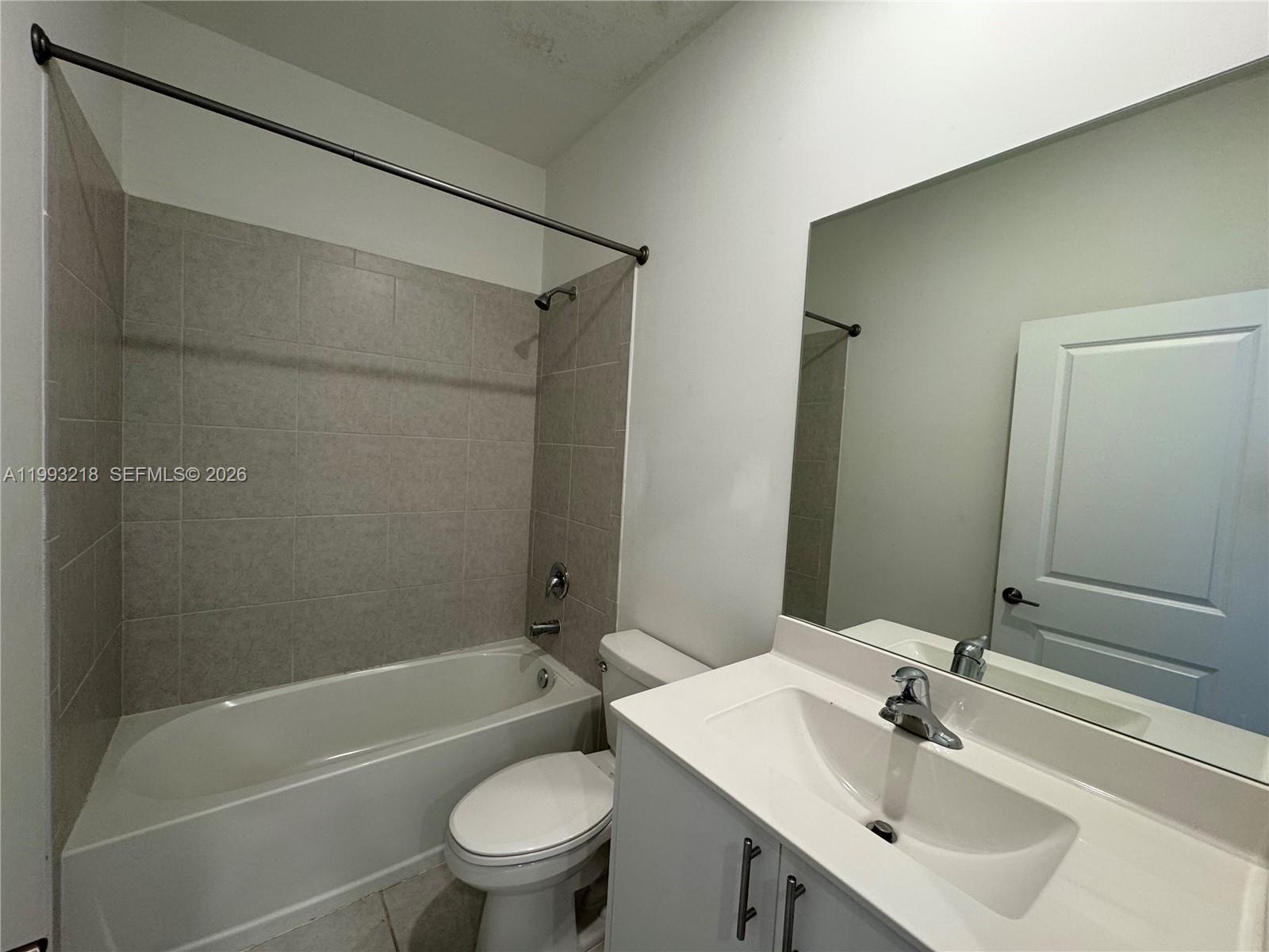 16227 Southwest 292nd Street Homestead, FL 33033 - Photo 18 of 28 a bathroom with a sink toilet and shower