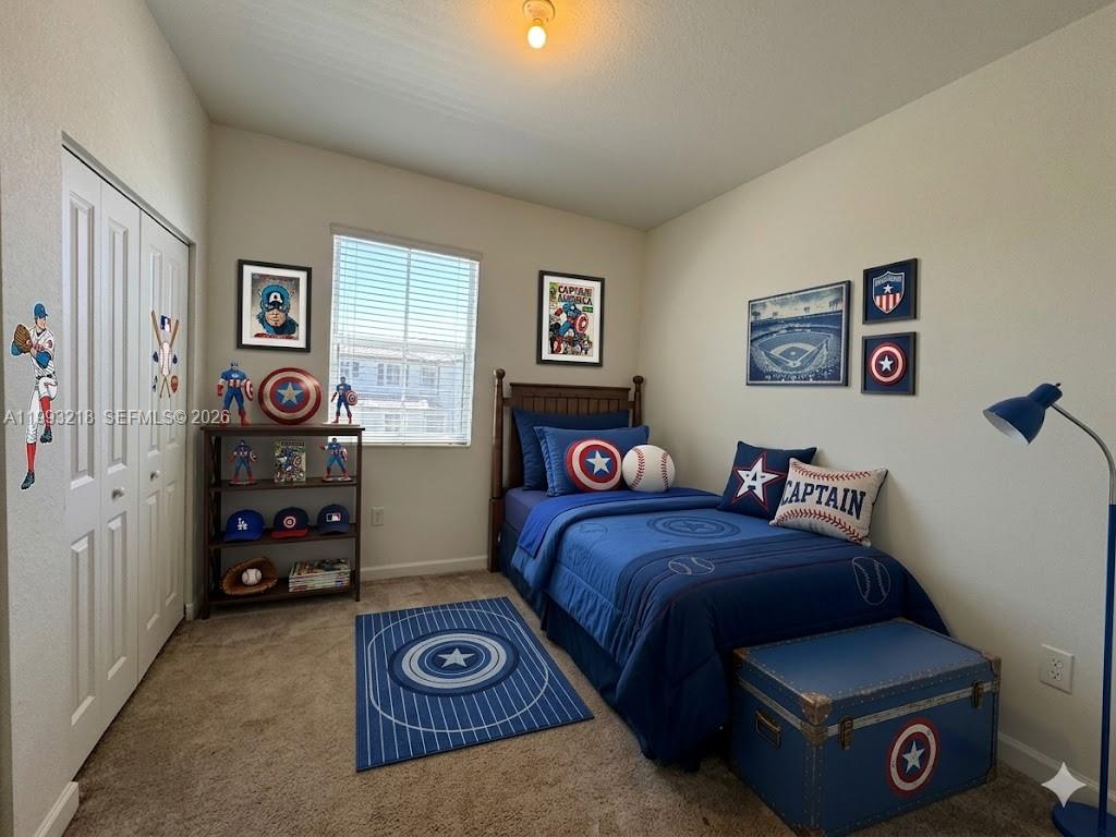 16227 Southwest 292nd Street Homestead, FL 33033 - Photo 20 of 28 a bedroom with a bed and a tv