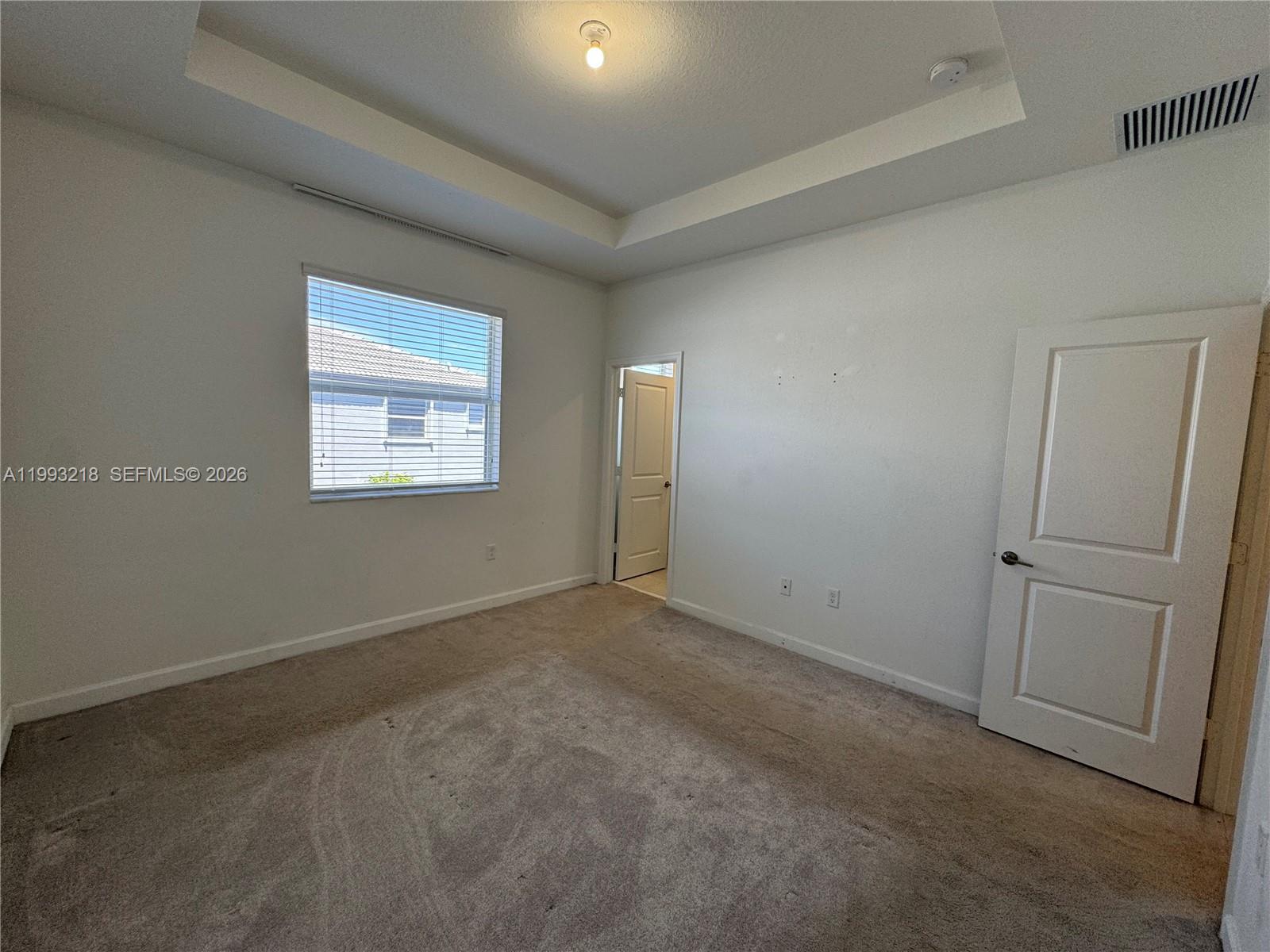 16227 Southwest 292nd Street Homestead, FL 33033 - Photo 22 of 28 an empty room with windows