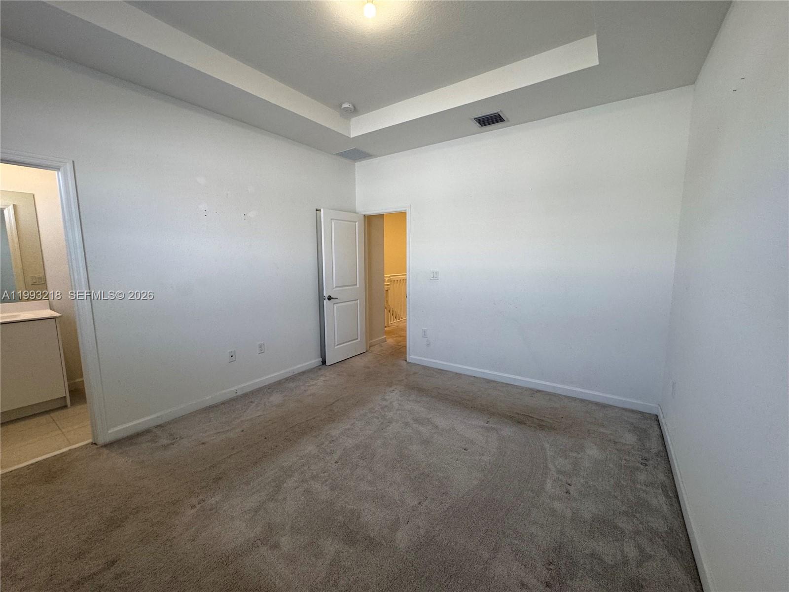 16227 Southwest 292nd Street Homestead, FL 33033 - Photo 24 of 28 an empty room with windows