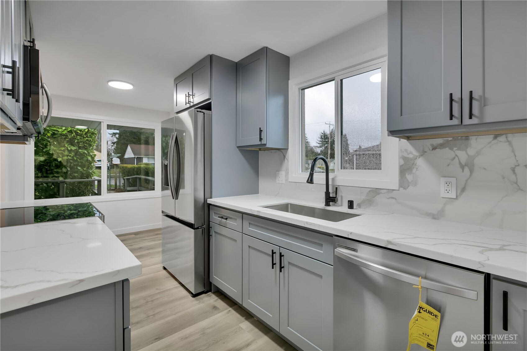 17017 4th Avenue Northeast Shoreline, WA 98155 - Photo 13 of 28 a kitchen with sink and window