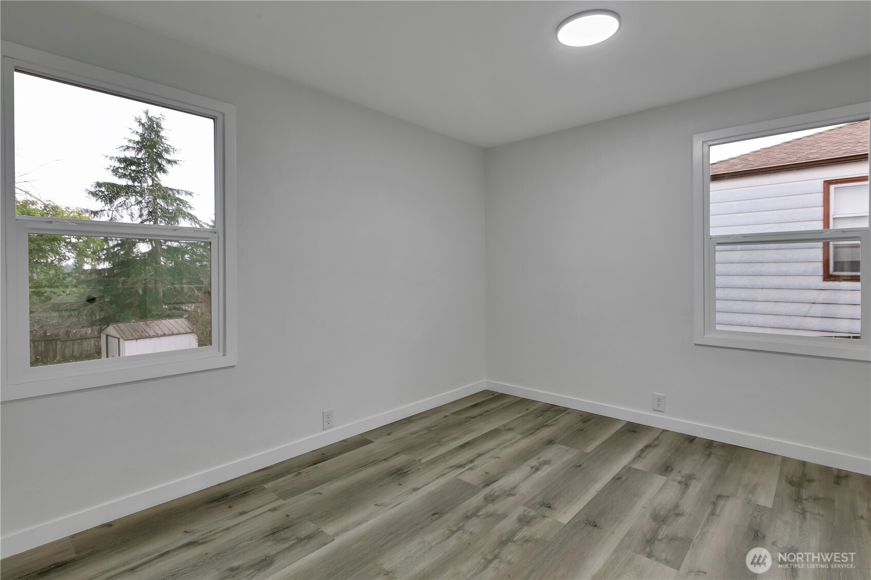 17017 4th Avenue Northeast Shoreline, WA 98155 - Photo 20 of 28 a view of a room that has a window in it