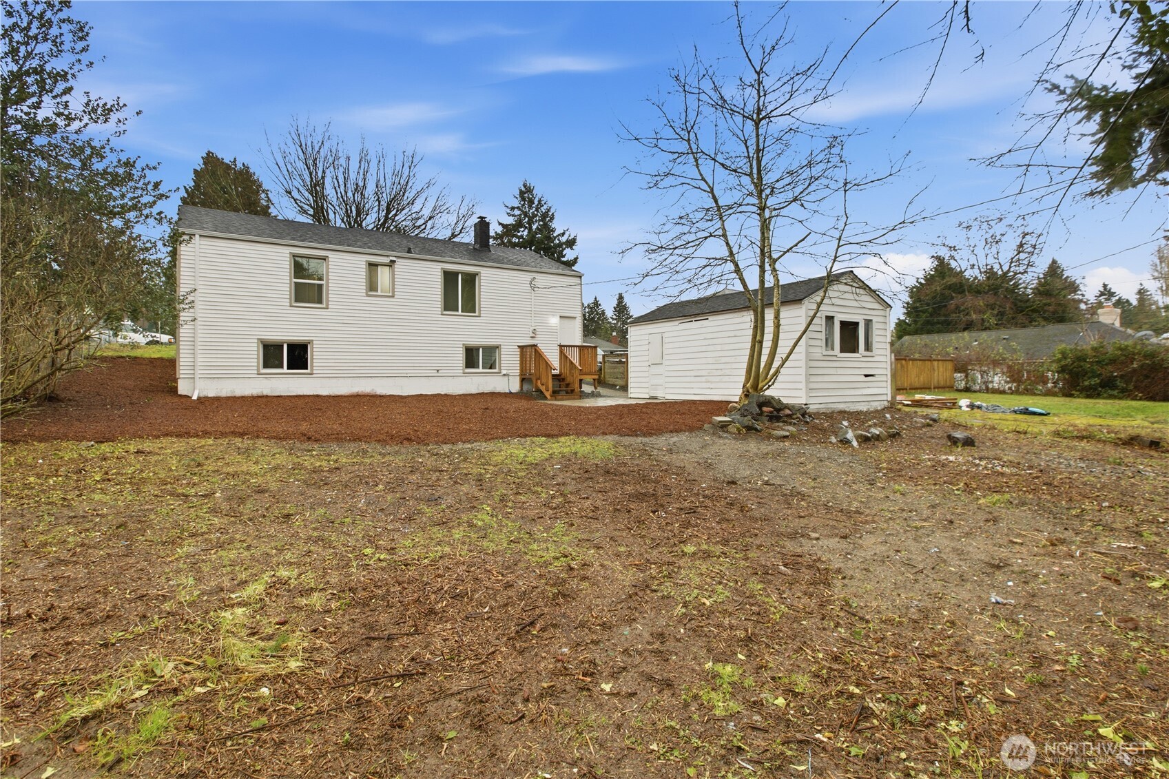17017 4th Avenue Northeast Shoreline, WA 98155 - Photo 27 of 28 a view of a house with a yard