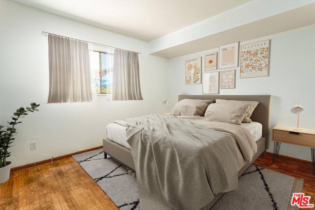 6352 Clyde Avenue San Diego, CA 92139 - Photo 18 of 30 a bedroom with a bed and a window