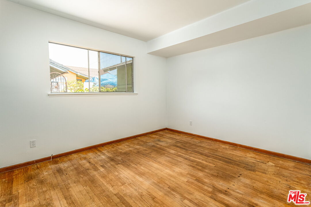6352 Clyde Avenue San Diego, CA 92139 - Photo 19 of 30 an empty room with a window