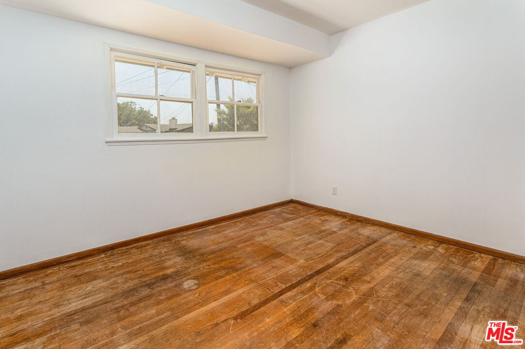 6352 Clyde Avenue San Diego, CA 92139 - Photo 20 of 30 an empty room with a window