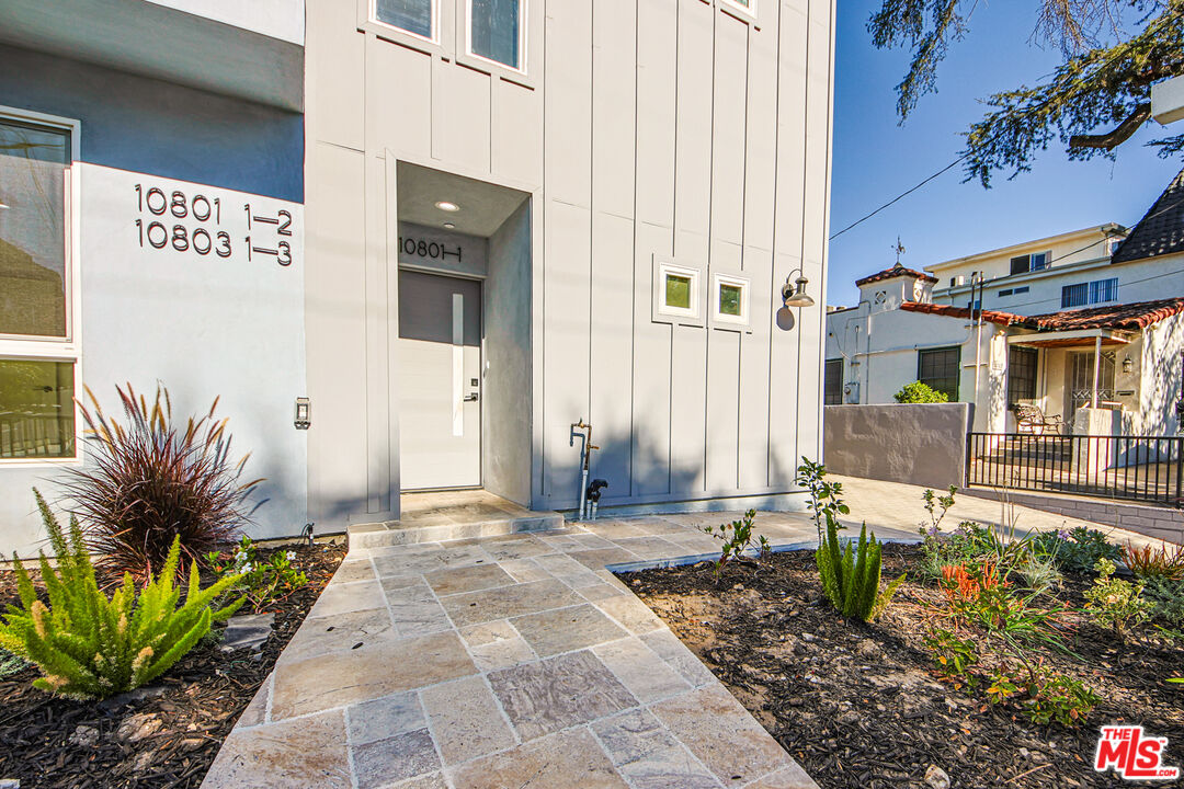 10803 Kling Street Toluca Lake, CA 91602 - Photo 3 of 25 a view of a house with a backyard