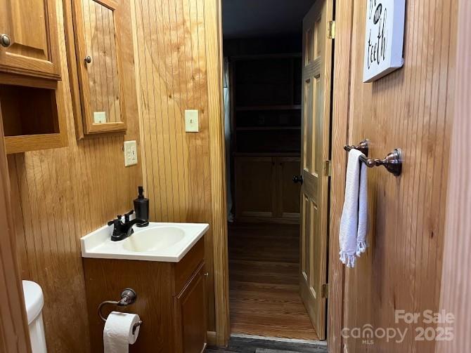 623 Edwards Cove Road Waynesville, NC 28786 - Photo 19 of 46 a bathroom with a sink and a mirror