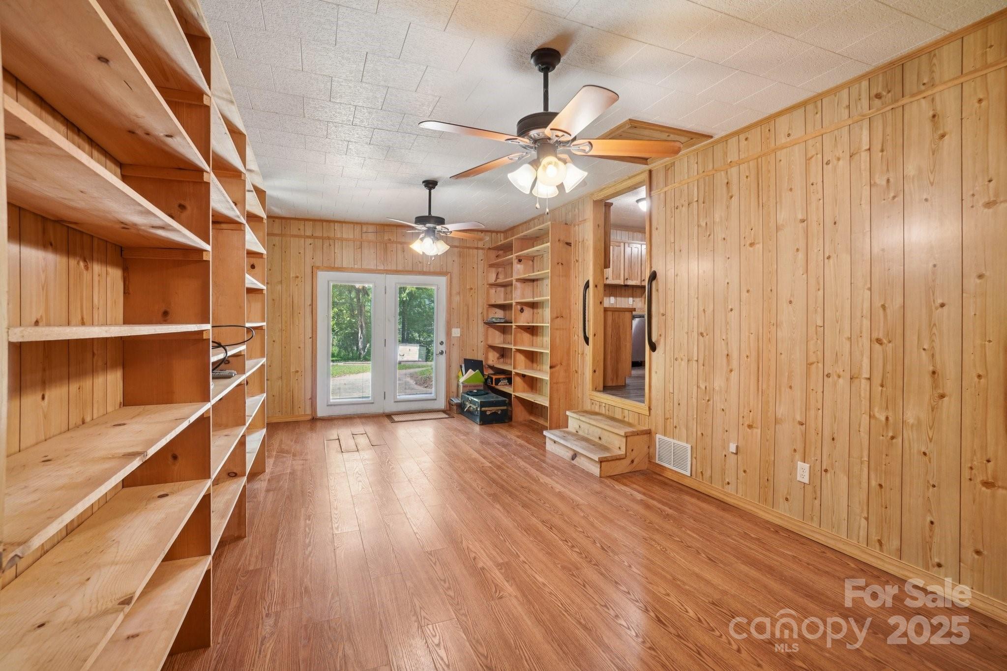 623 Edwards Cove Road Waynesville, NC 28786 - Photo 30 of 46 a view of an empty room with a window