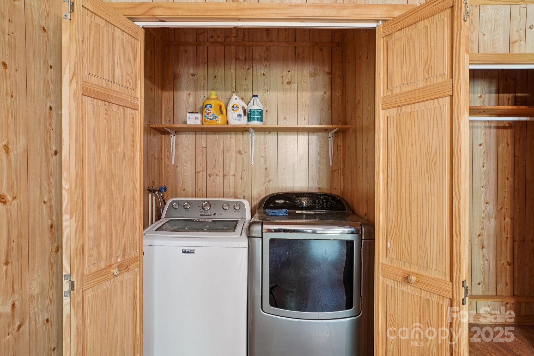 623 Edwards Cove Road Waynesville, NC 28786 - Photo 32 of 46 a kitchen with a stove and a refrigerator