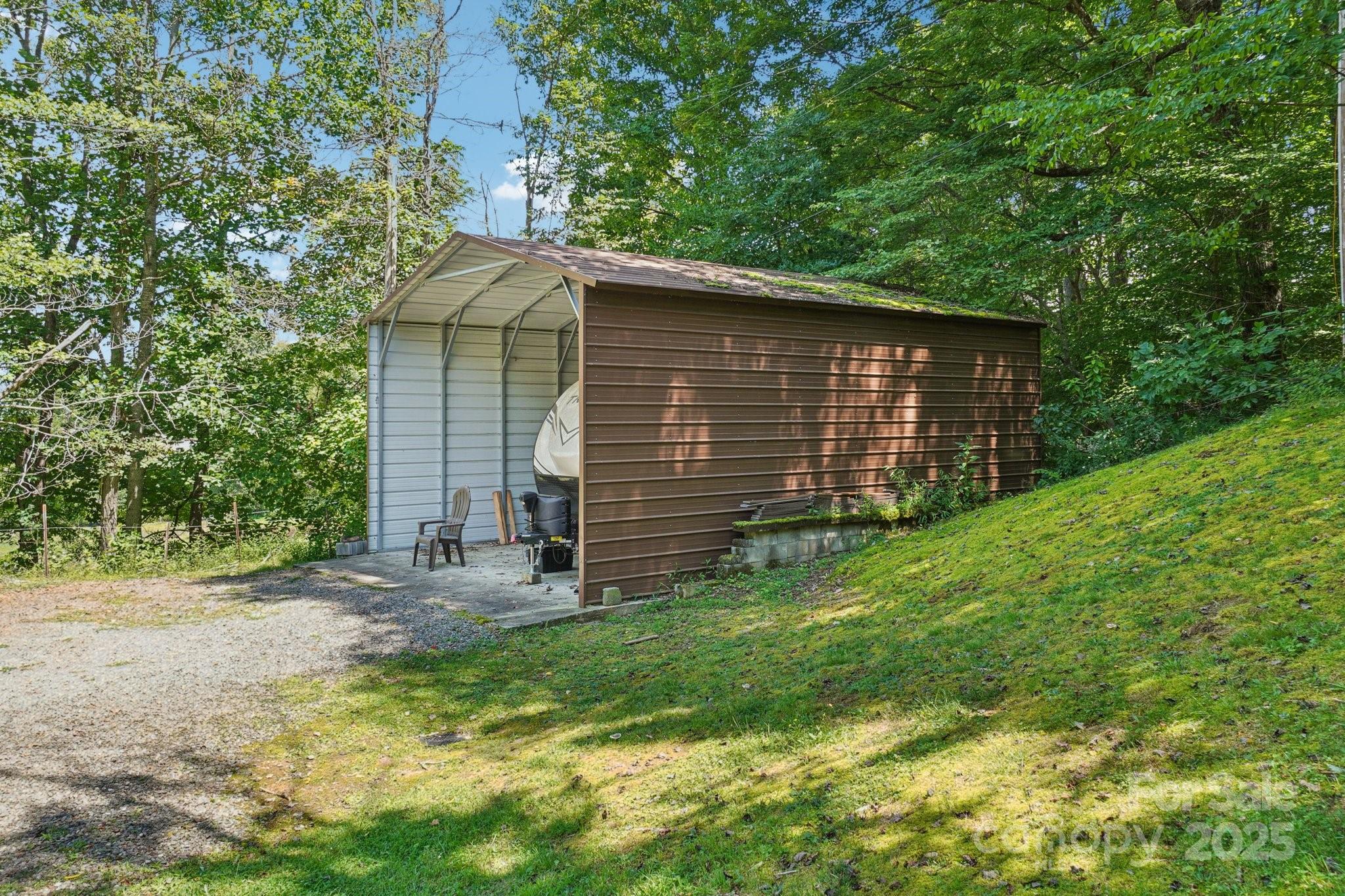 623 Edwards Cove Road Waynesville, NC 28786 - Photo 37 of 46 a view of backyard of house with green space