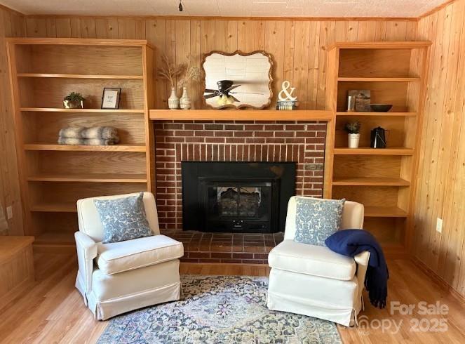 623 Edwards Cove Road Waynesville, NC 28786 - Photo 4 of 46 a living room with furniture and a fireplace