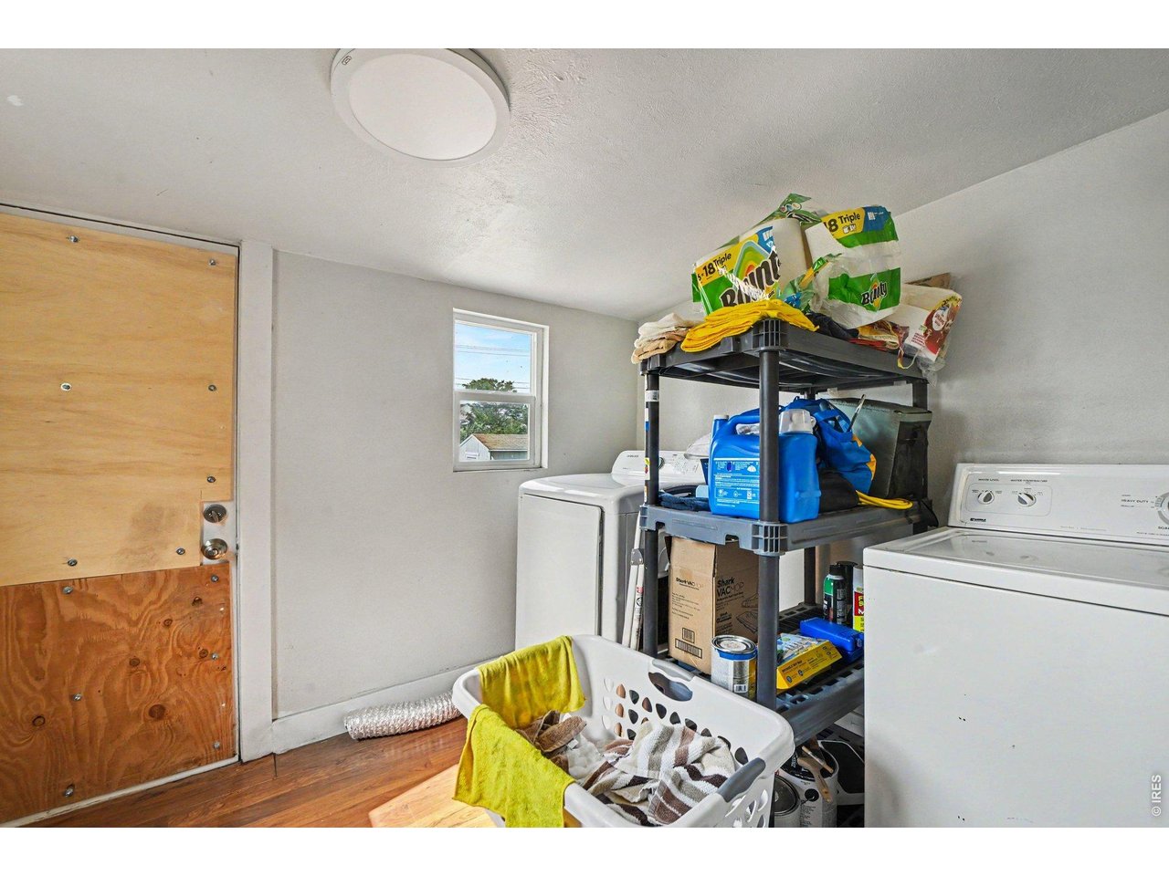 427 9th Street Greeley, CO 80631 - Photo 17 of 22 a bedroom with furniture and a bed