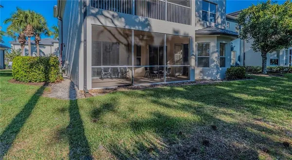 a view of a building with a yard