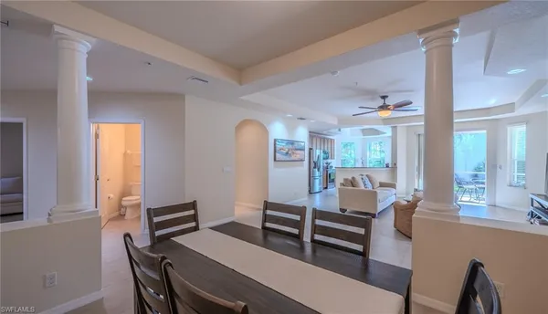 a living room with furniture and a window