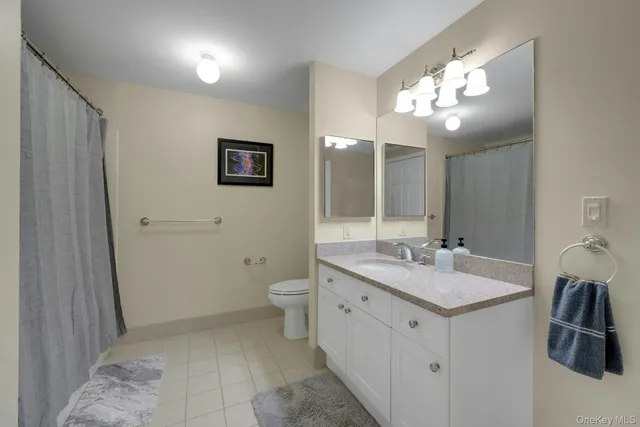 a view of a livingroom with furniture and window