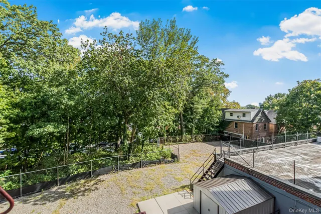 a lobby with furniture and window
