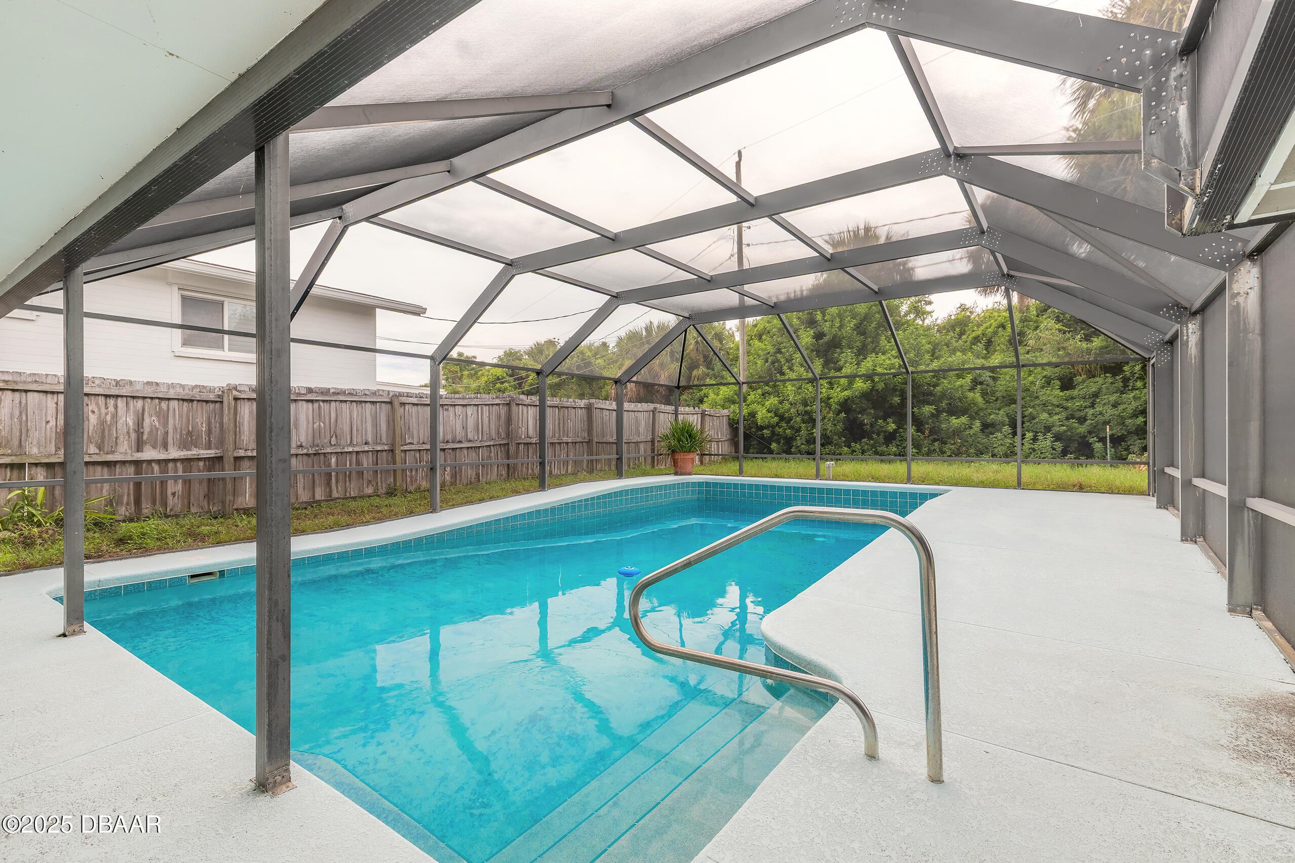 45 Rivocean Drive Ormond Beach, FL 32176 - Photo 24 of 37 a swimming pool with a yard