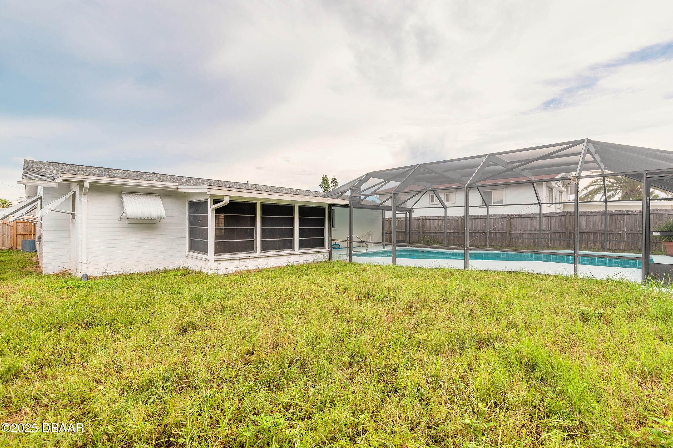 45 Rivocean Drive Ormond Beach, FL 32176 - Photo 27 of 37 a view of a house with a swimming pool
