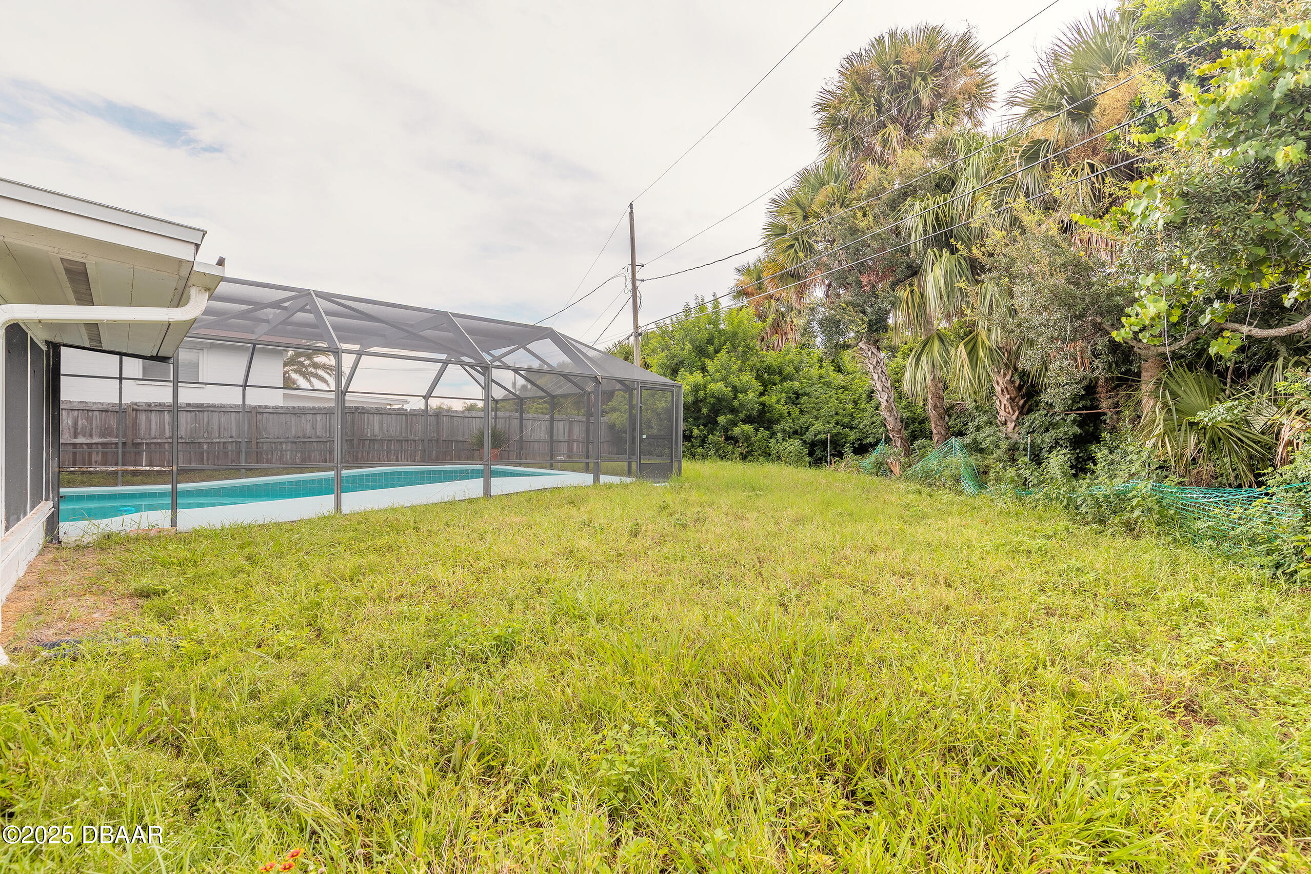 45 Rivocean Drive Ormond Beach, FL 32176 - Photo 28 of 37 a view of pool with a big yard and large trees
