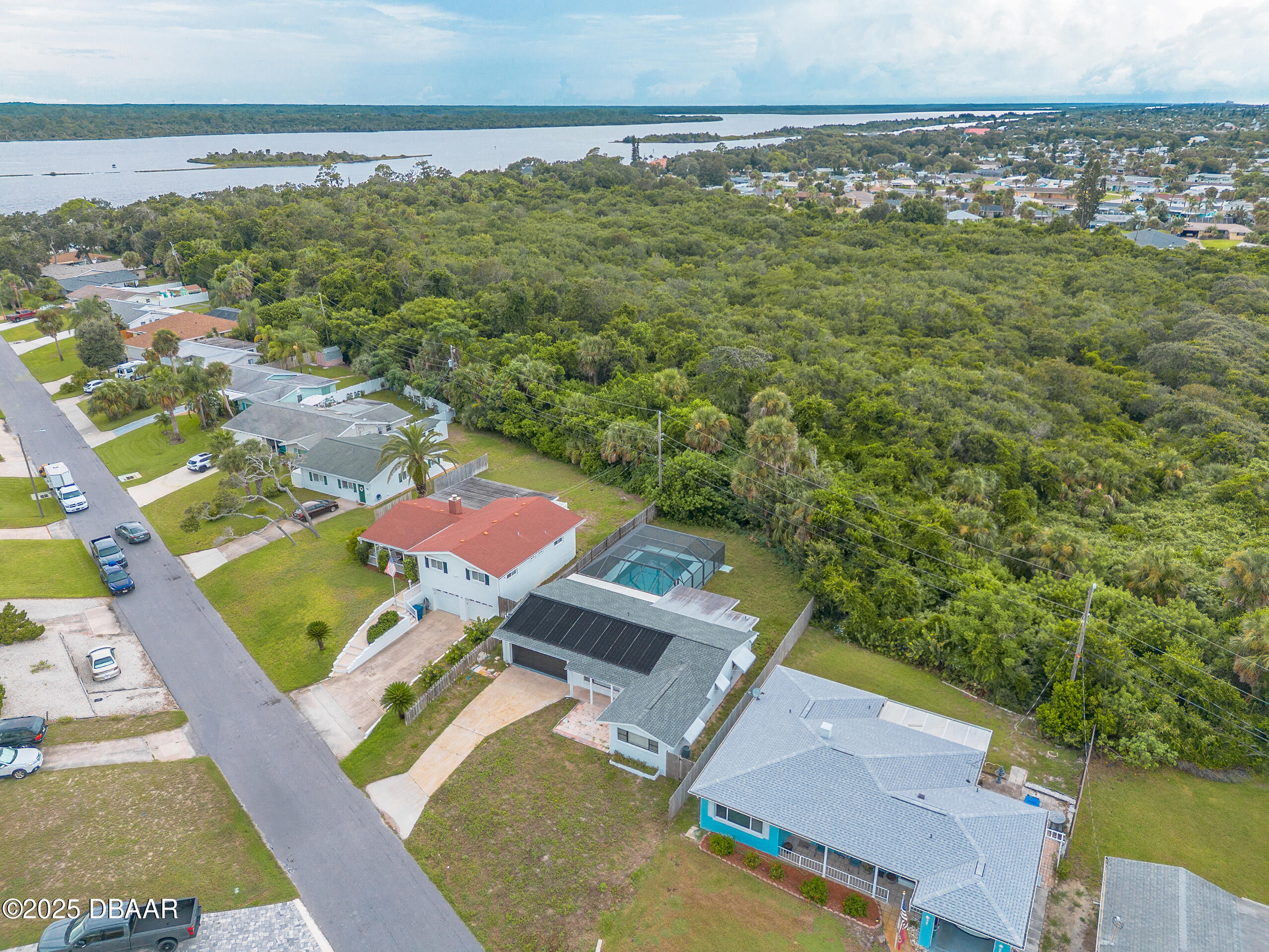 45 Rivocean Drive Ormond Beach, FL 32176 - Photo 29 of 37 an aerial view of a house with a garden