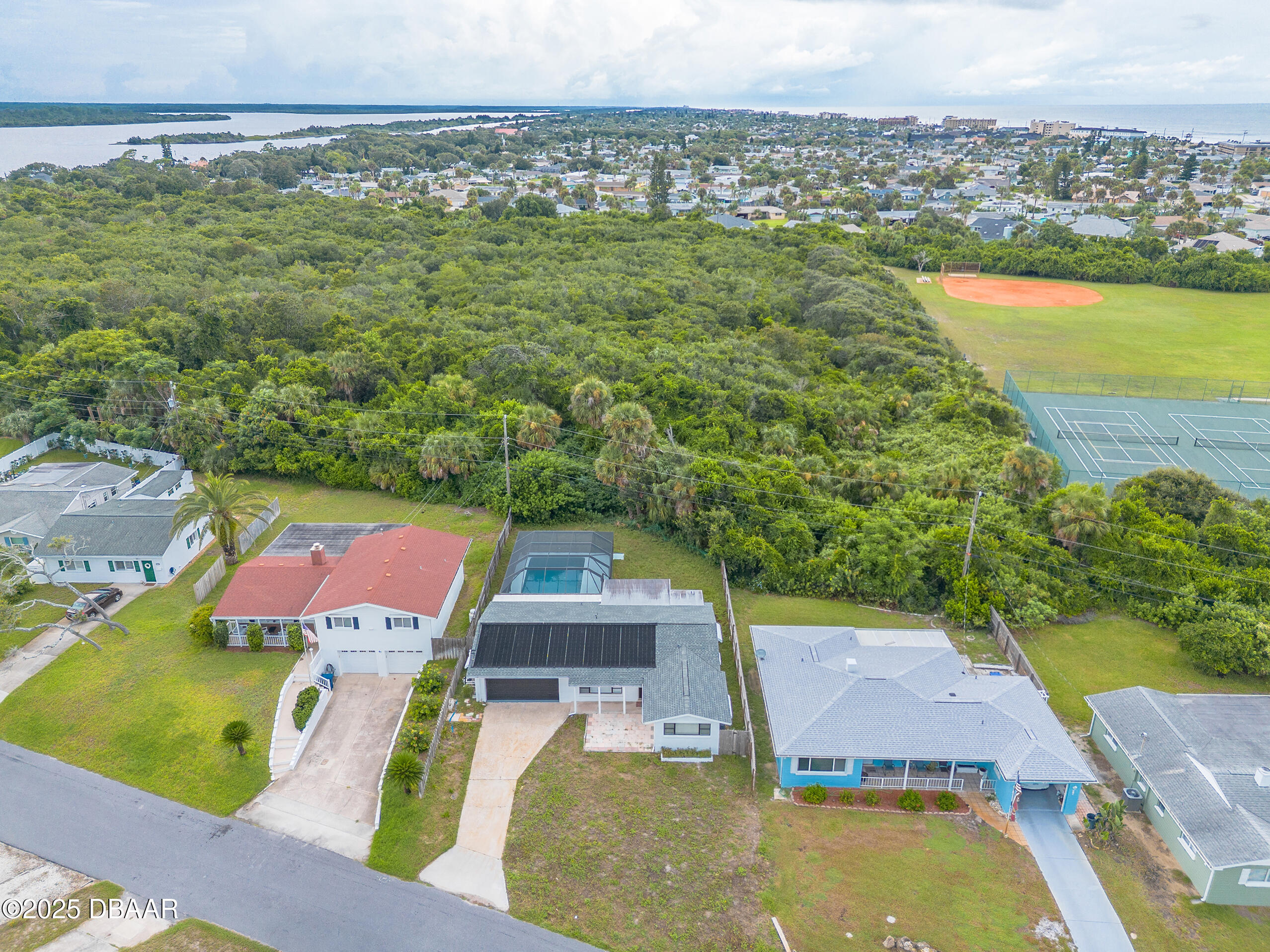 45 Rivocean Drive Ormond Beach, FL 32176 - Photo 30 of 37 an aerial view of a house with a garden