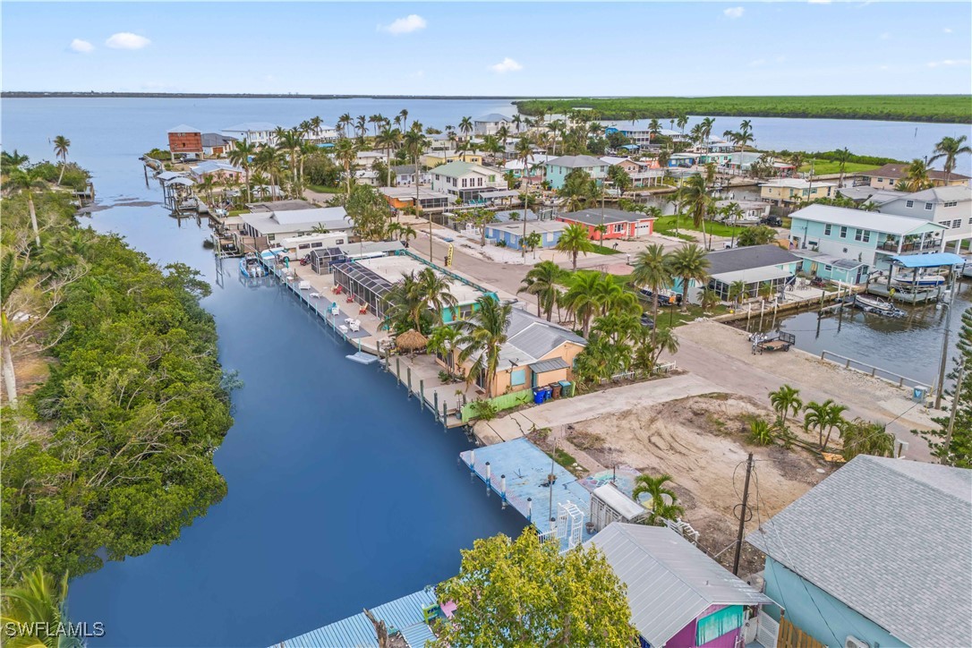 11306 Matlacha Avenue Matlacha, FL 33993 - Photo 11 of 11 a view of a city with an ocean