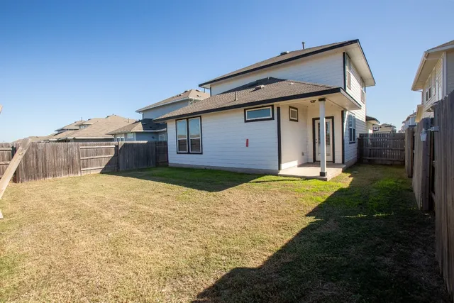a view of an outdoor space and a house