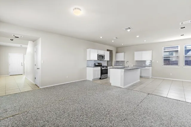 a view of kitchen with wooden floor