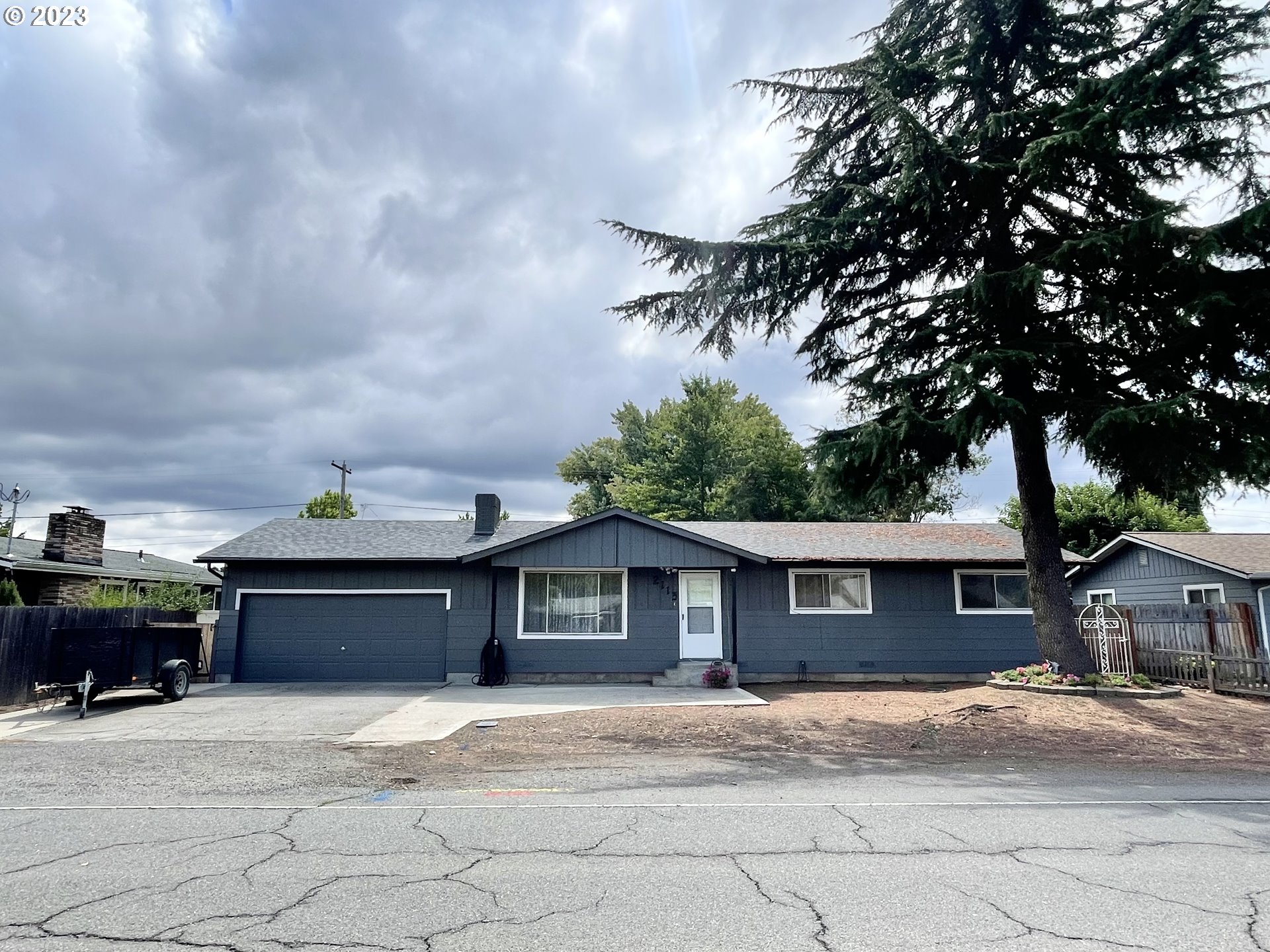 2113 Austin Road Roseburg, OR 97471 - Photo 1 of 36 a front view of a house with a garage